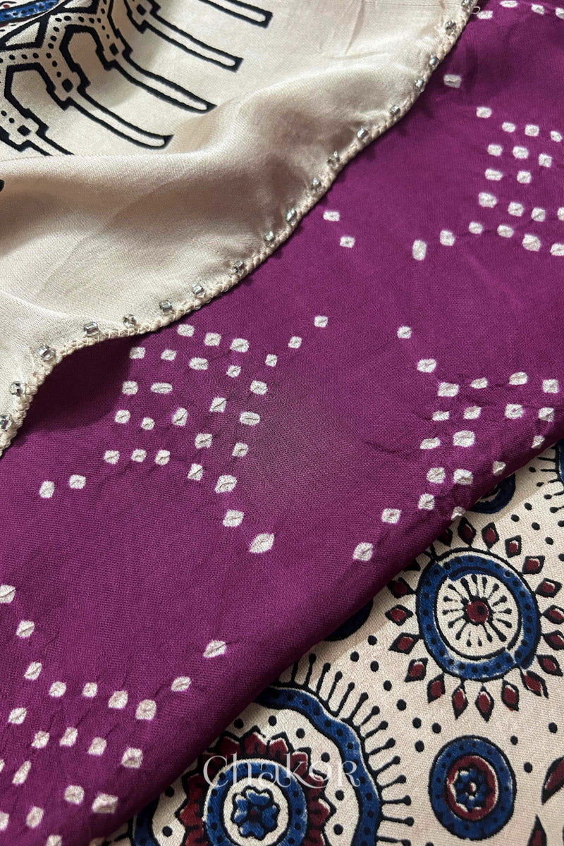  Magenta Bandhani and Off-white Ajrakh combination modal stole with glass bead edging detail on pallu end.
